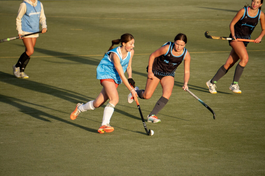 michigan youth pinnacle field hockey players in action